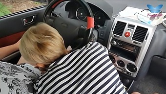 A Prostitute Performs Oral Sex On A Man In A Vehicle