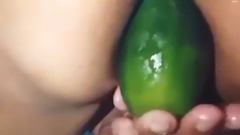 Stepmom Flaunts Her Open Ass By Using A Large Cucumber On Camera